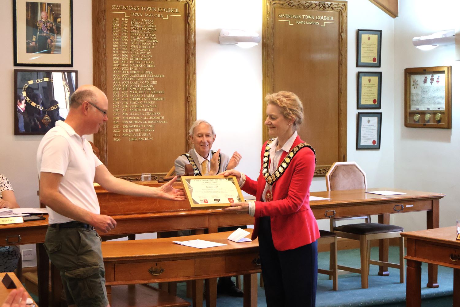 Councillor Ancrum presents James Ball with award