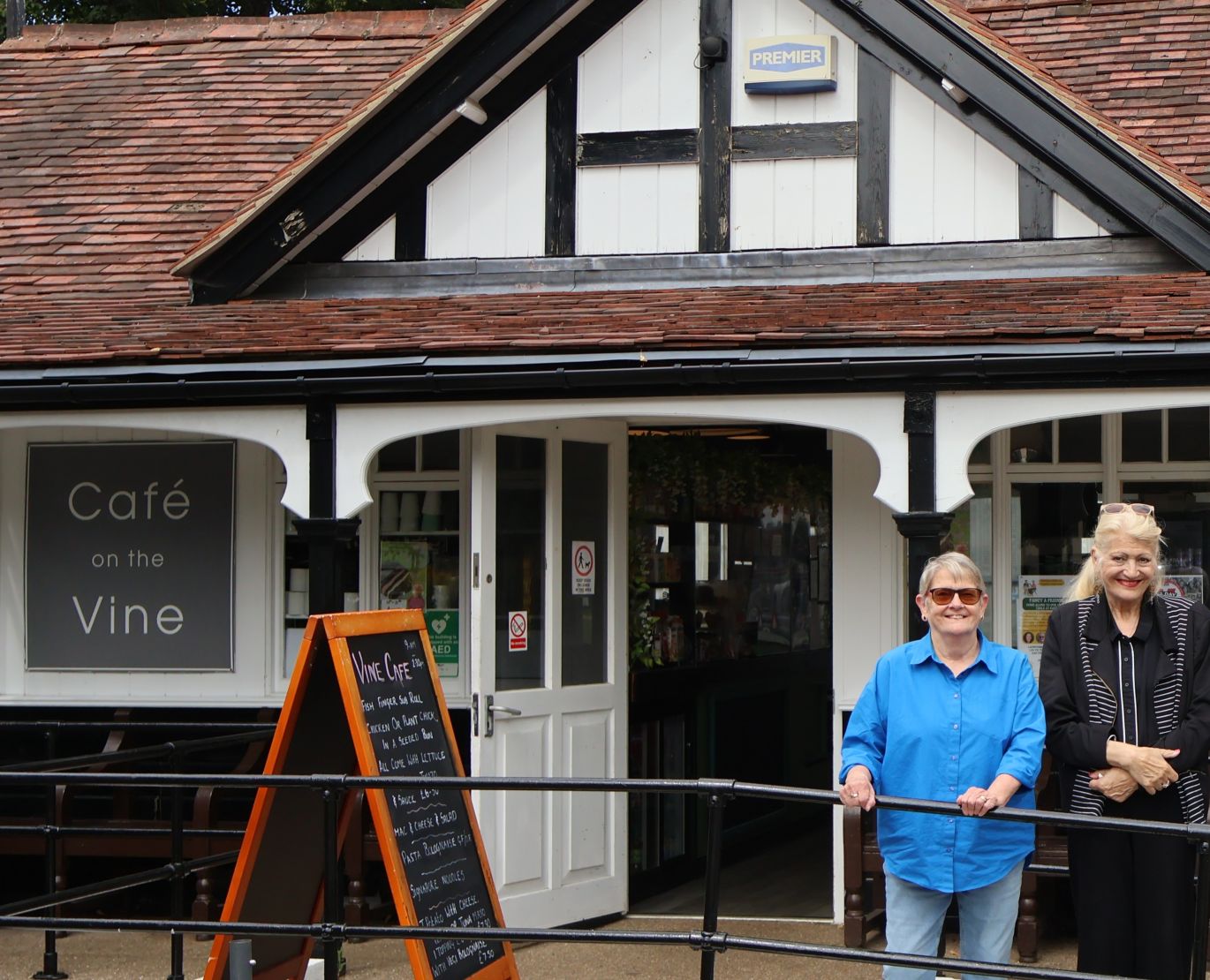 Two volunteers at Cafe on the Vine